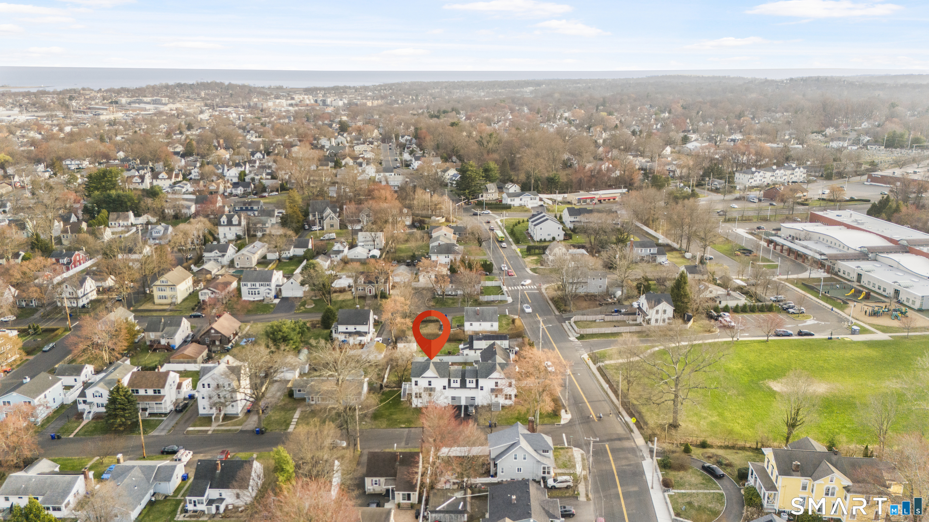 183 Vesper Street Fairfield, CT 06825 - Photo 36 of 40 an aerial view of residential building with parking space