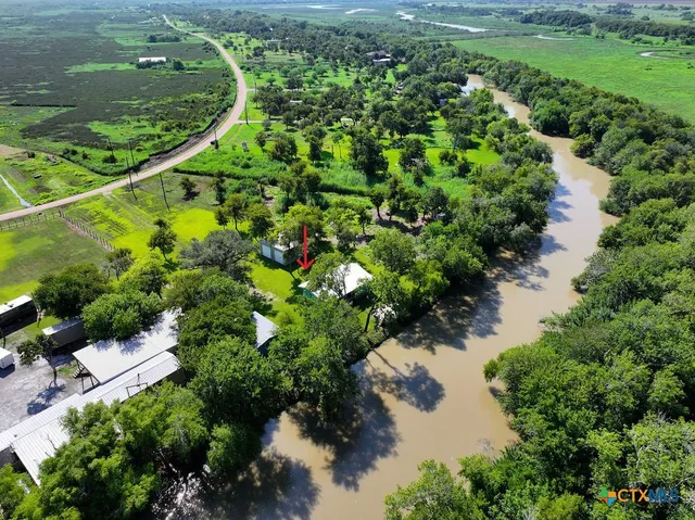a view of a garden with a lake