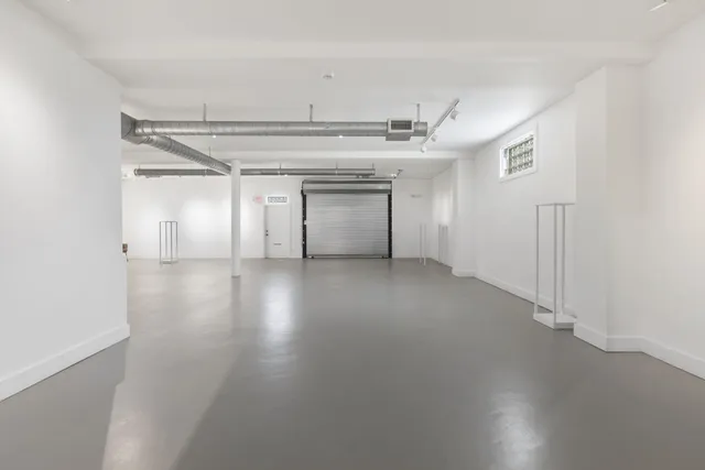 a view of a room with an empty space