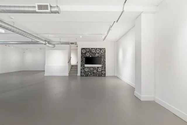 a view of entryway and hall with a window