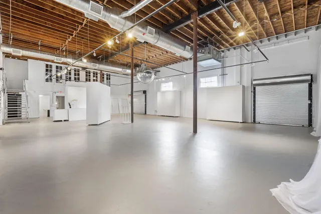 a view of a room with wooden walls