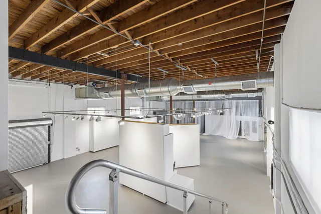 a view of a room with racks on the wall