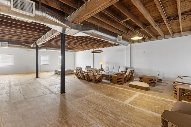 a view of a garage with chairs