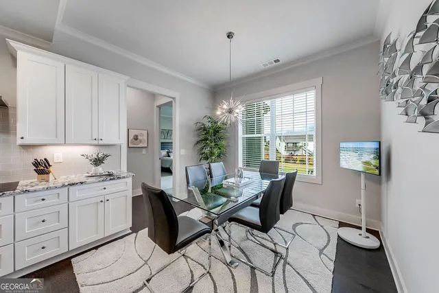 a living room with furniture and window
