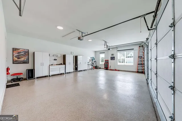 a view of a livingroom with hardwood floor and a ceiling fan