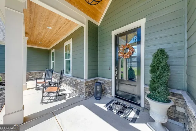 a front view of a house with a porch