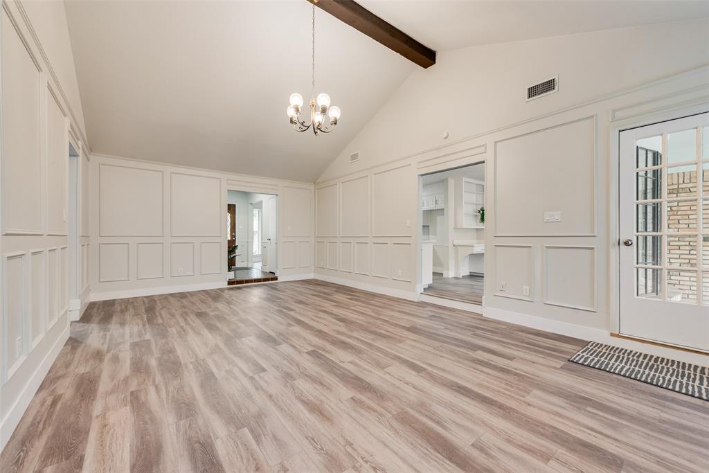 4801 Rock Ridge Court Arlington, TX 76017 - Photo 15 of 27 a view of empty room with wooden floor and fan