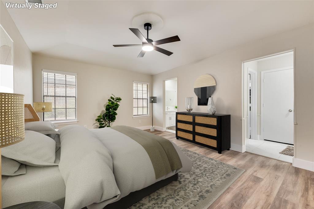4801 Rock Ridge Court Arlington, TX 76017 - Photo 23 of 27 a bedroom with a bed and window