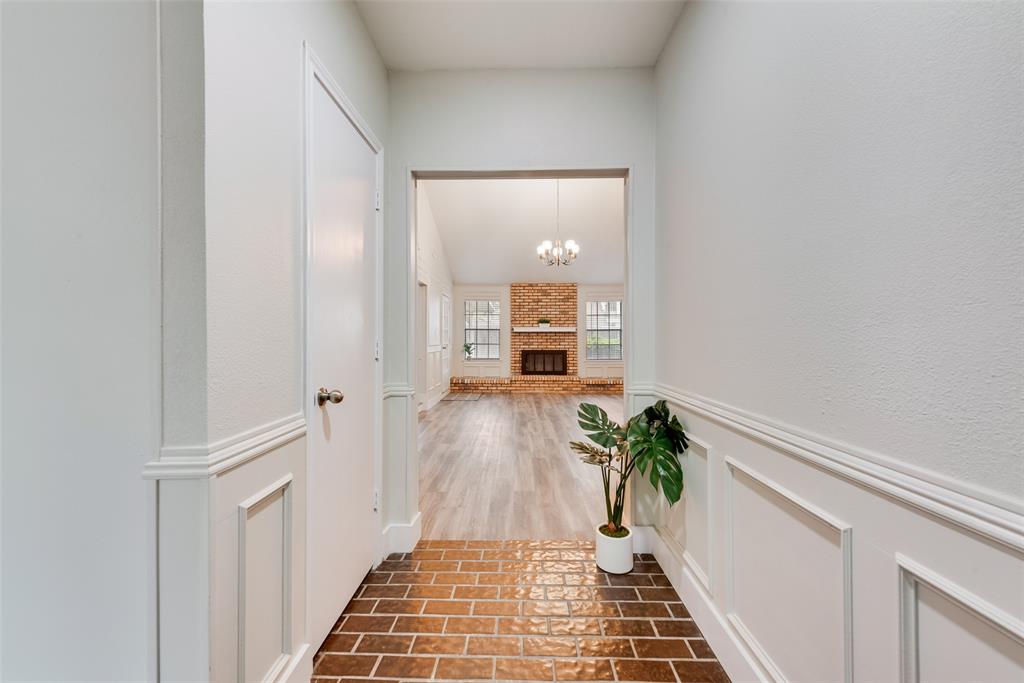 4801 Rock Ridge Court Arlington, TX 76017 - Photo 3 of 27 a view of a hallway and wooden floor