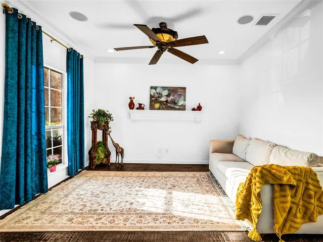 a view of kitchen with refrigerator and window