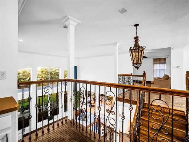 a view of a porch with wooden floor
