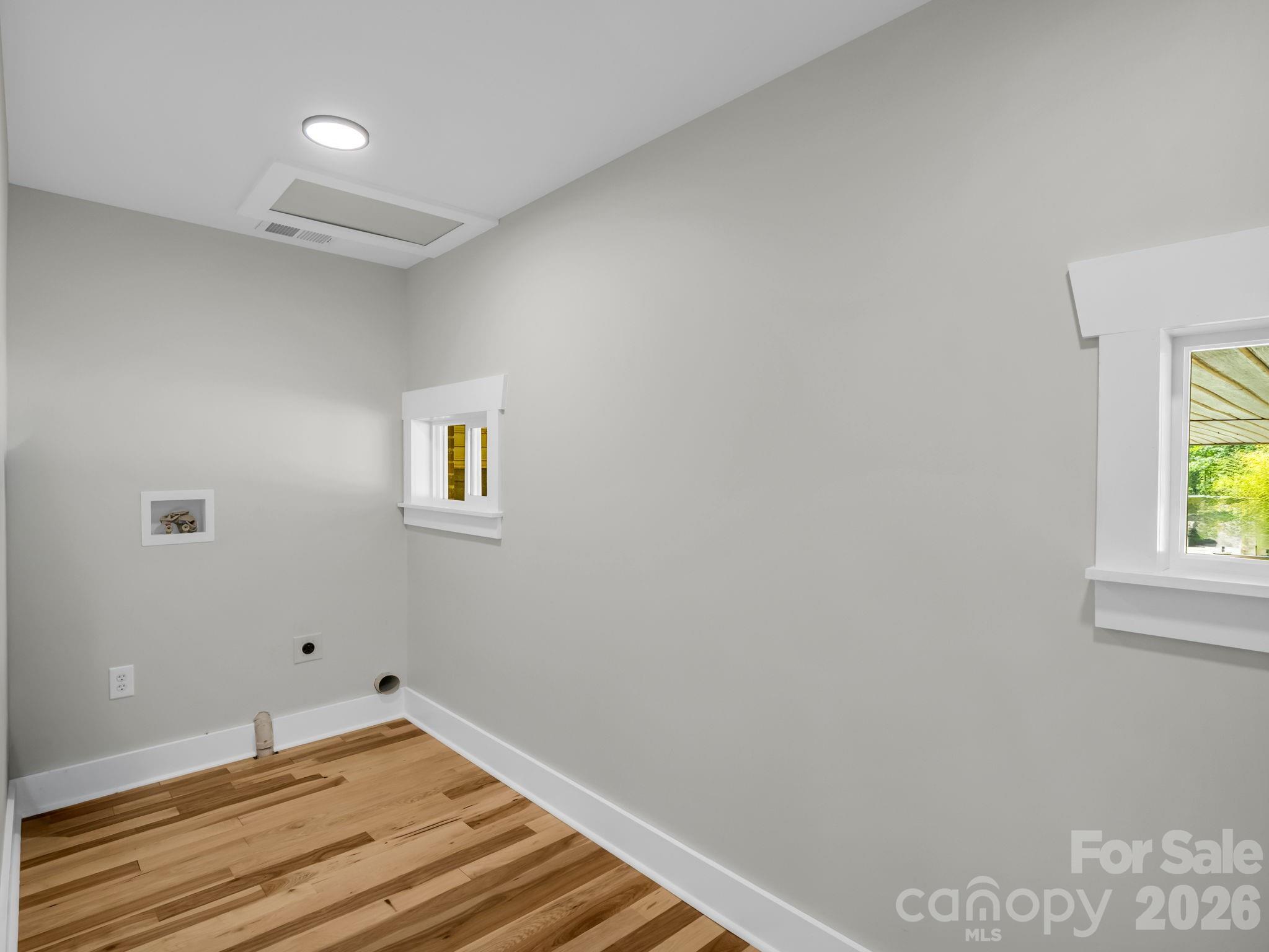 5923 Highway 14 Landrum, SC 29356 - Photo 13 of 15 a room with a wooden floor and a window
