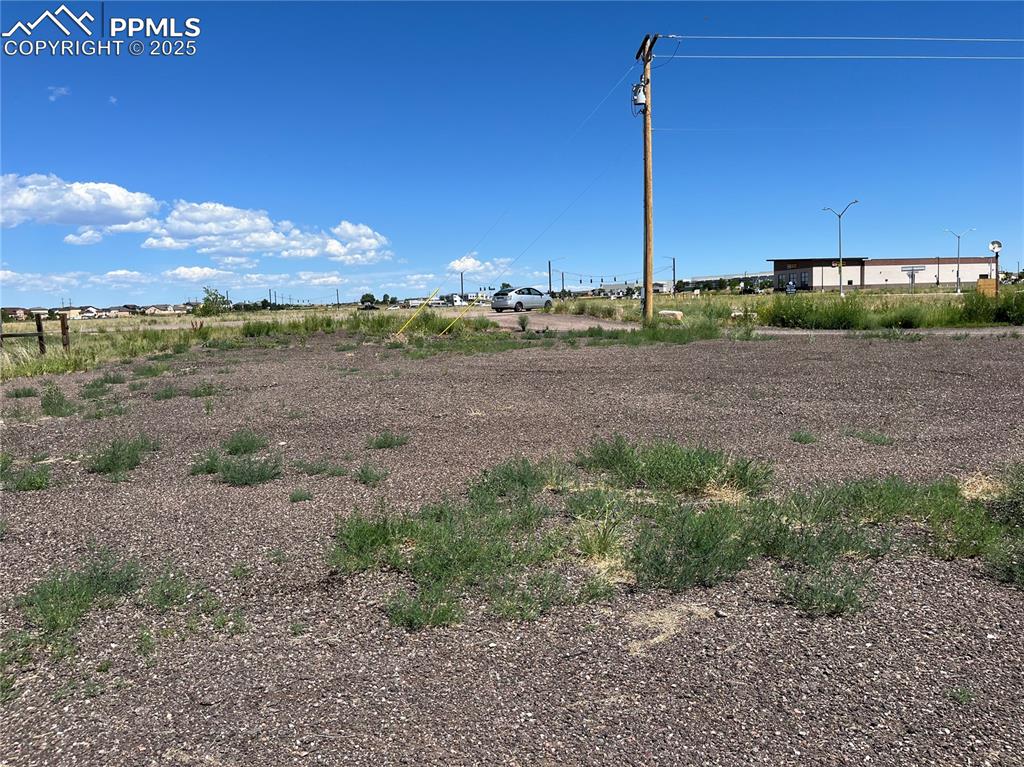 7110 Old Meridian Road Peyton, CO 80831 - Photo 16 of 26 a view of a road with an ocean view