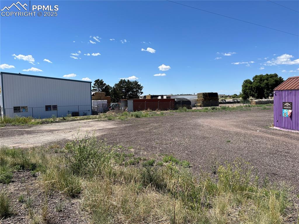7110 Old Meridian Road Peyton, CO 80831 - Photo 9 of 26 a view of an outdoor space and deck of the house