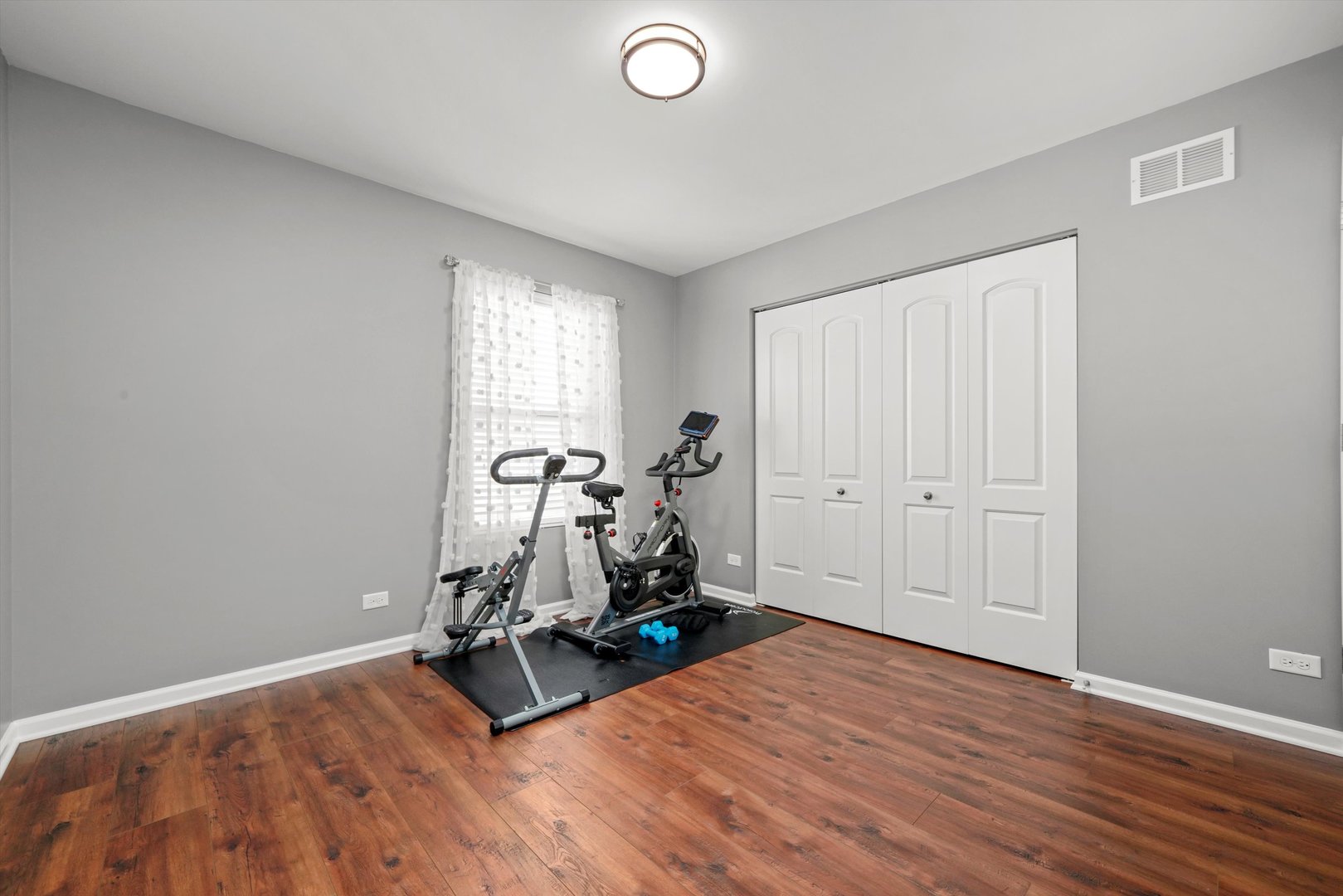 749 North Misty Ridge Drive Romeoville, IL 60446 - Photo 21 of 44 a view of a room with gym equipment
