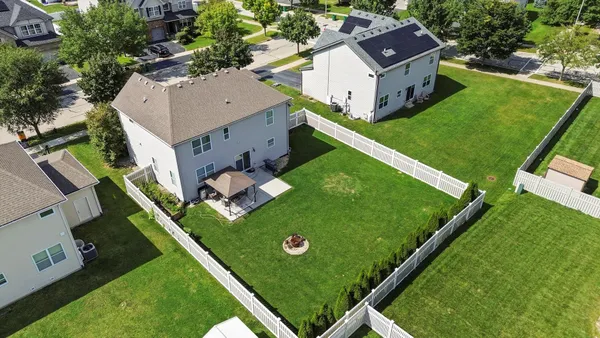 an aerial view of residential house with outdoor space