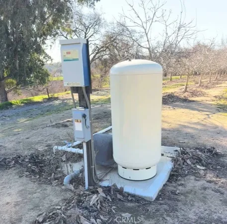 a view of a backyard of the house