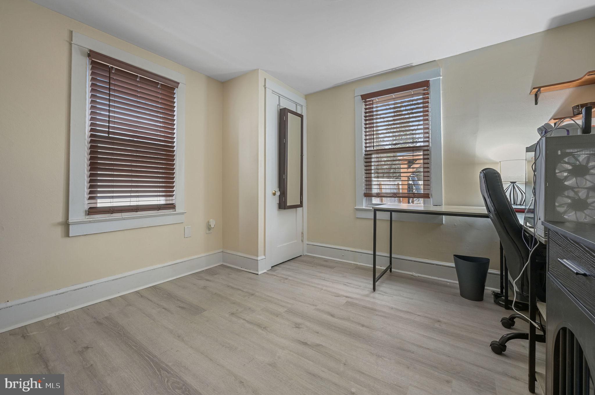 1014 White Oak Road Dover, DE 19901 - Photo 14 of 17 a view of a workspace with furniture and a window