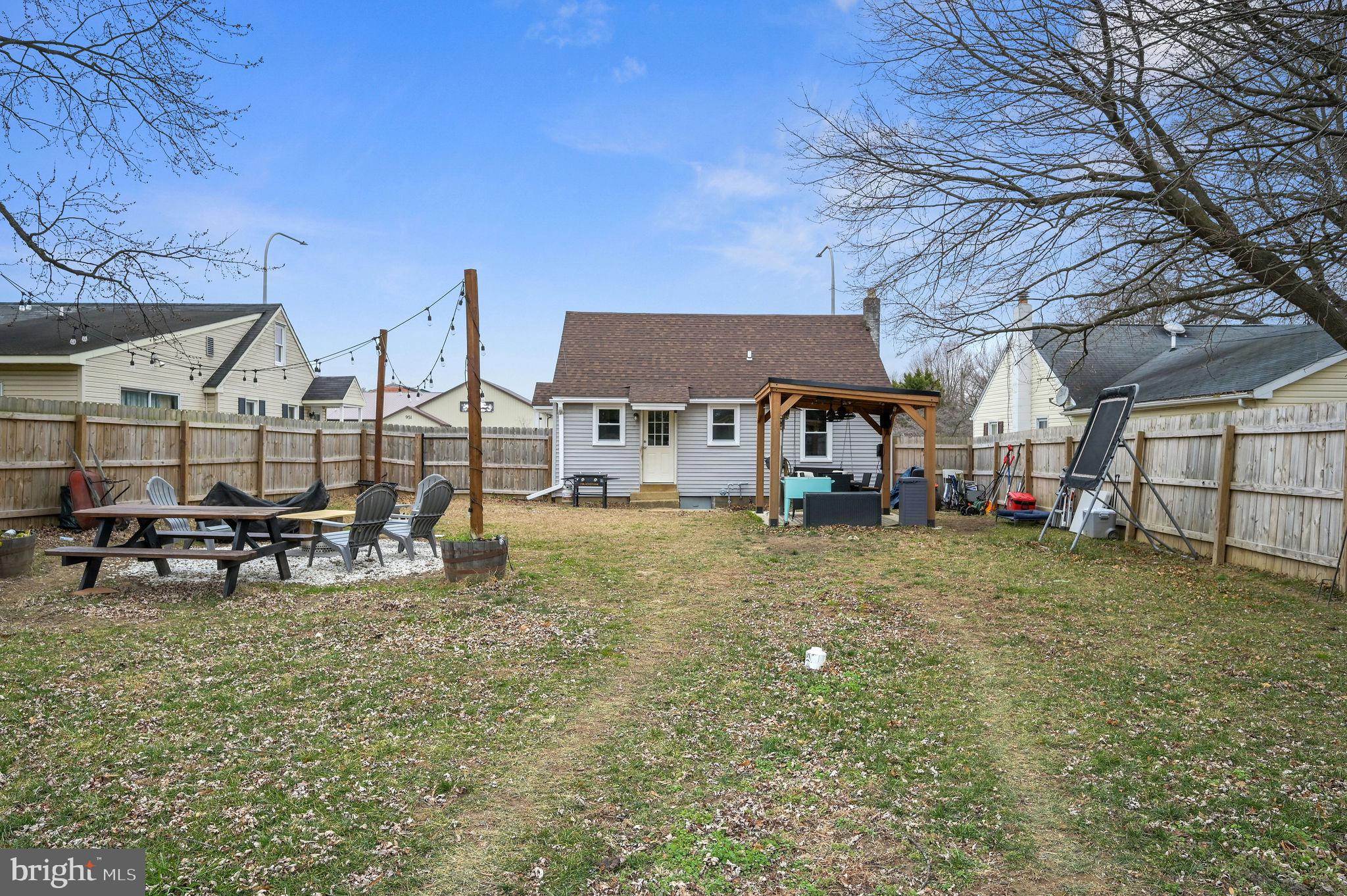 1014 White Oak Road Dover, DE 19901 - Photo 15 of 17 a view of a house with a backyard
