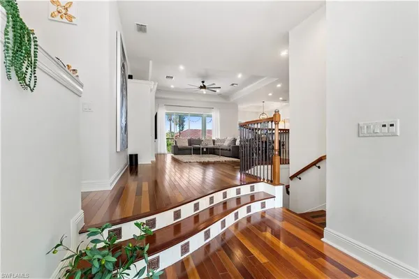 a view of entryway with wooden floor