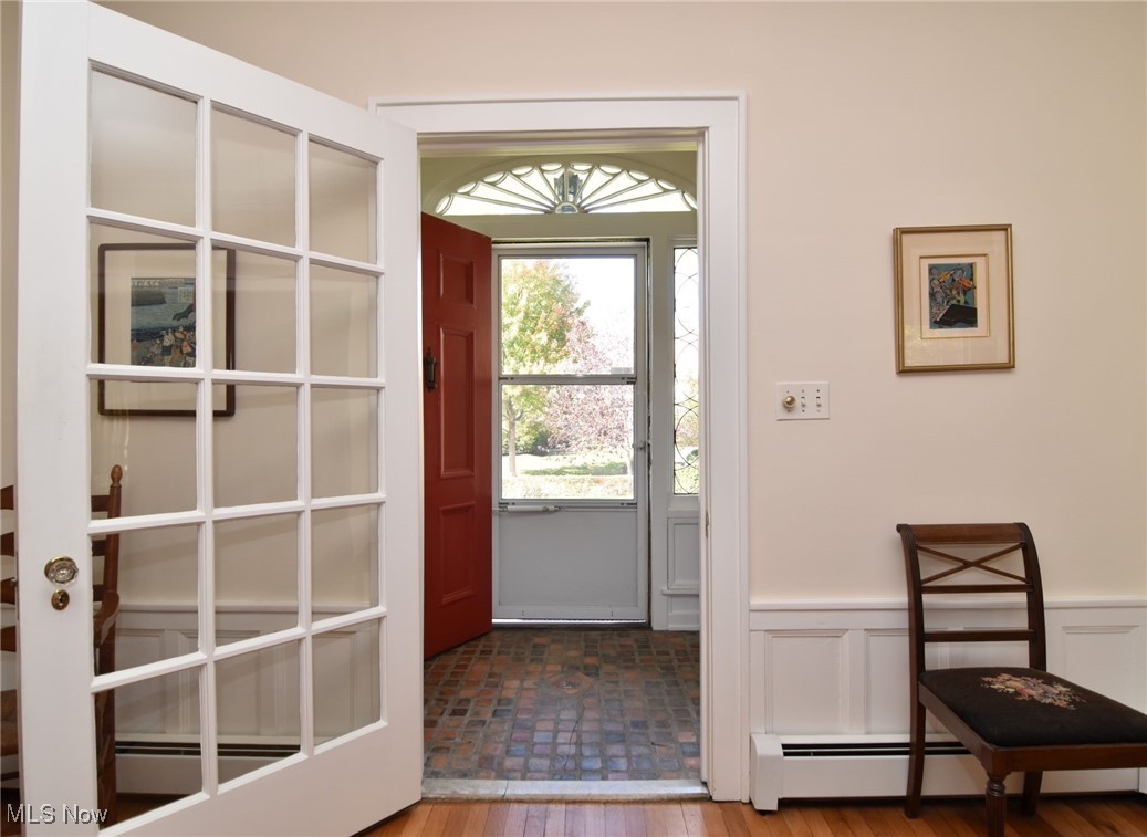 2887 Kingsley Road Shaker Heights, OH 44122 - Photo 3 of 40 The entry Vestibule showcases some of this detail with a lovely fan window over the door and leaded glass side windows. Note also the vintage tile flooring