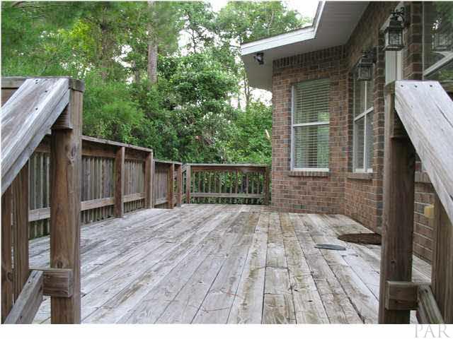 2555 Valley Road Navarre, FL 32566 - Photo 19 of 24 ENJOY YOUR COFFEE IN YOUR LARGE OPEN WOODEN DECK