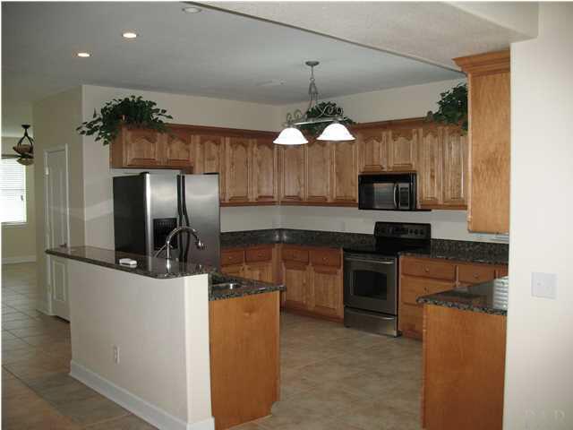 2555 Valley Road Navarre, FL 32566 - Photo 4 of 24 SPACIOUS FULLY EQUIPPED KITCHEN