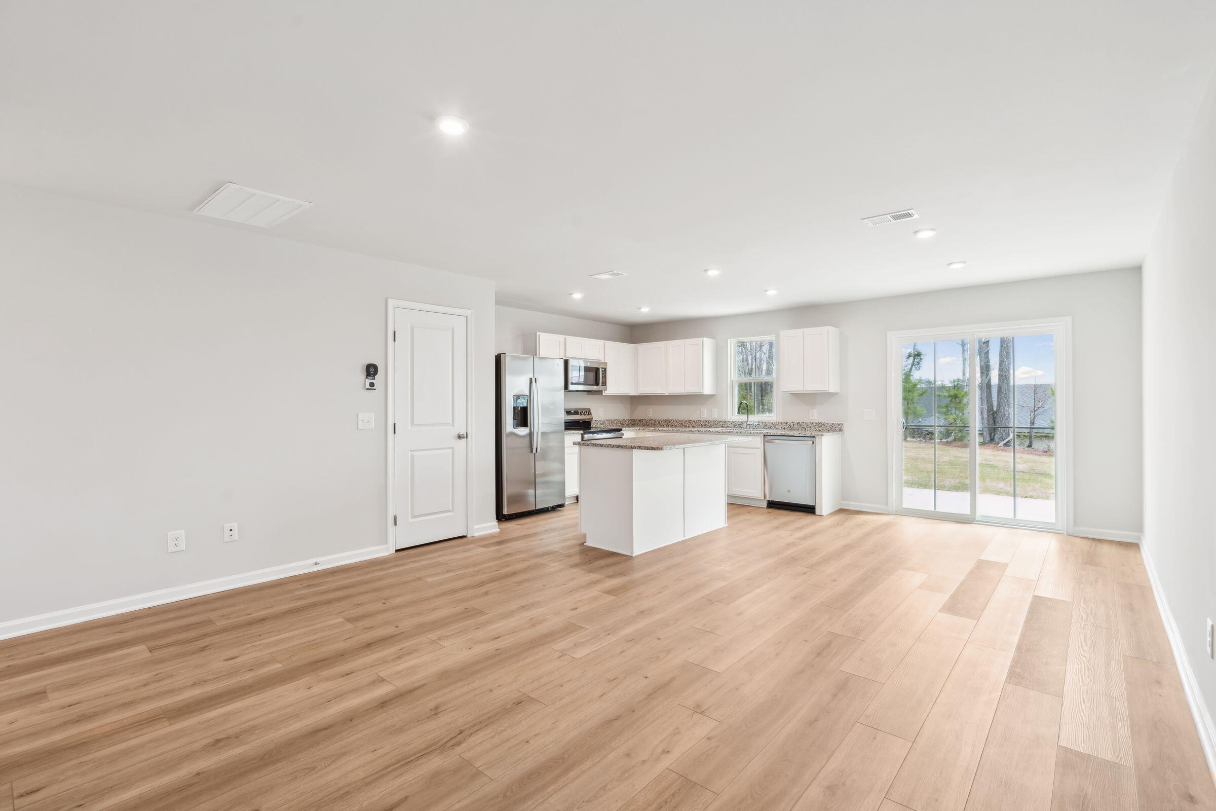 102 Tancaw Place Santee, SC 29142 - Photo 11 of 33 LVP Floors entire main level