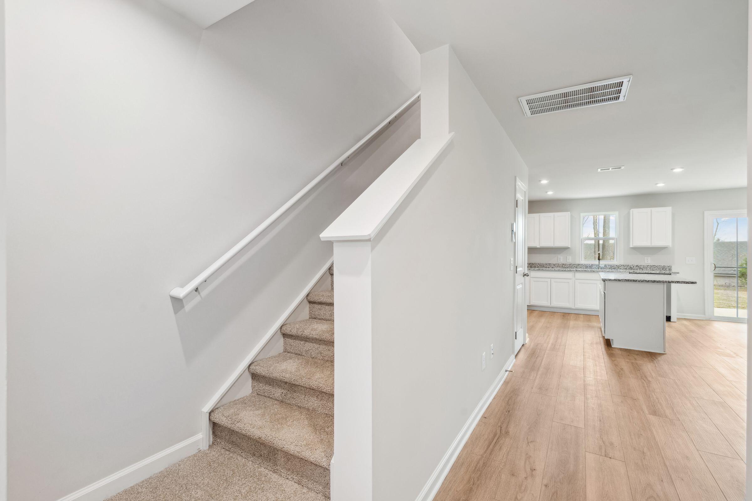 102 Tancaw Place Santee, SC 29142 - Photo 14 of 33 Staircase to upper level