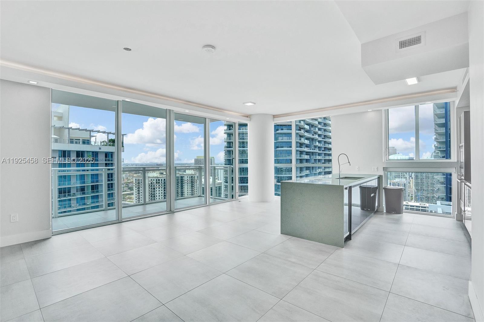 1080 Brickell Avenue, Unit 4109 Miami, FL 33131 - Photo 3 of 23 a view of a room with a large window