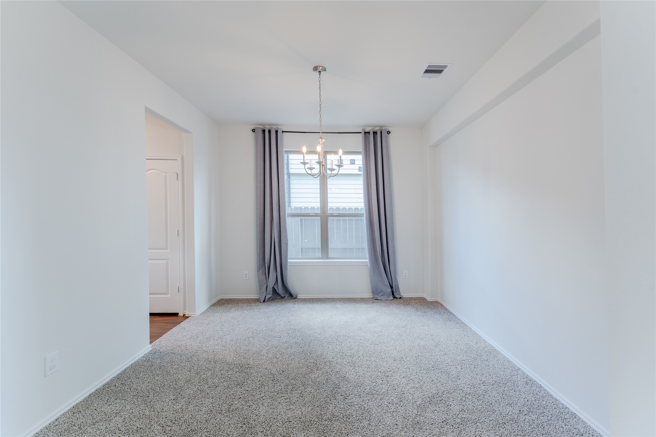 8327 Threadfin Way Fulshear, TX 77441 - Photo 17 of 40 a view of an empty room with a window