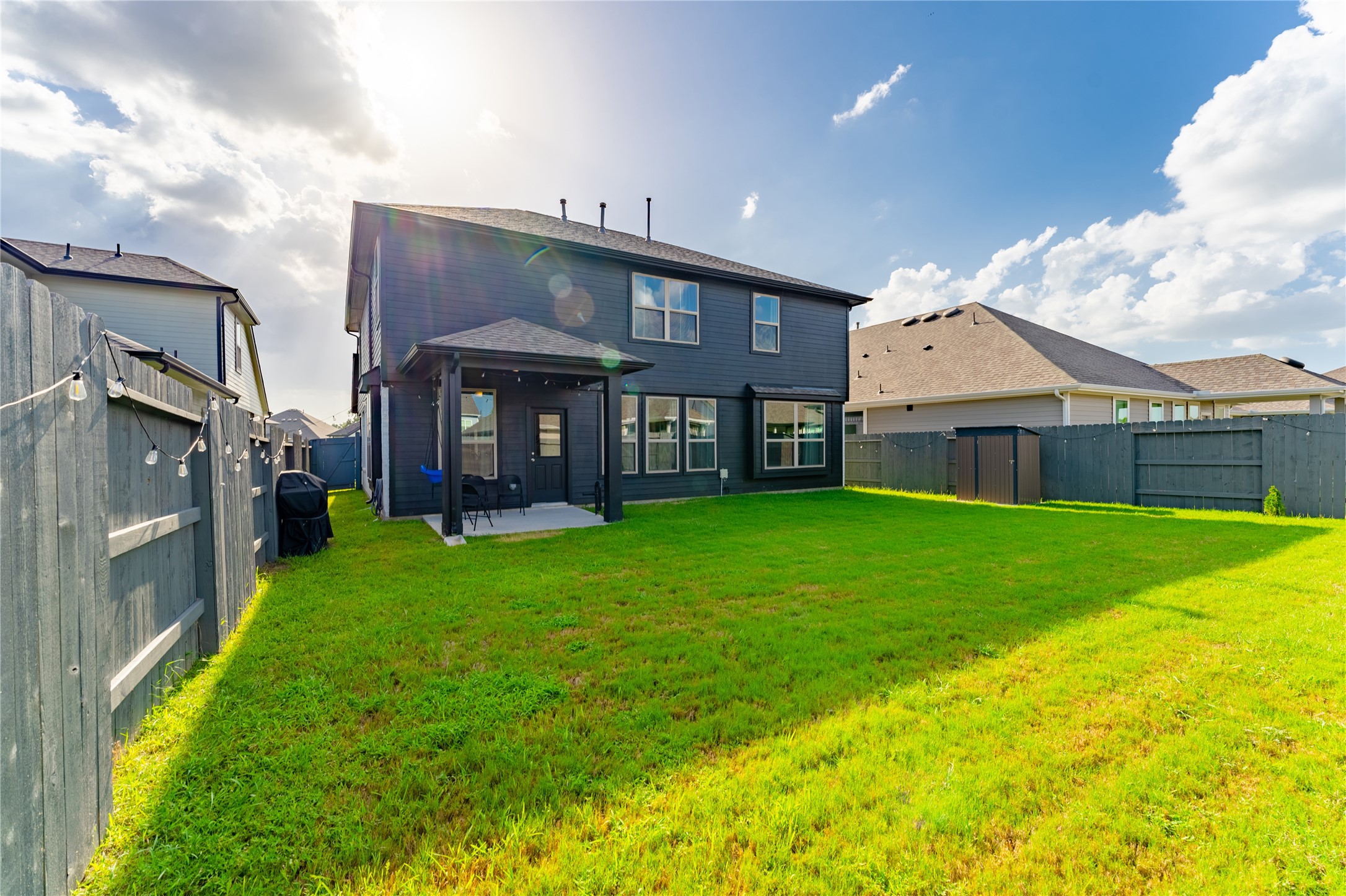 8327 Threadfin Way Fulshear, TX 77441 - Photo 33 of 40 a view of an house with backyard and balcony