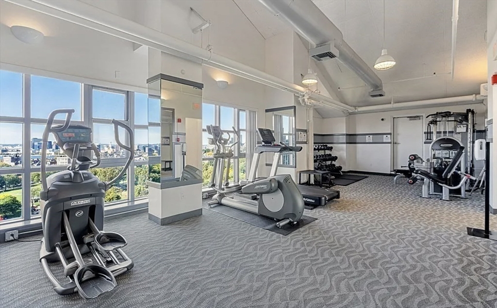 170 Tremont Street, Unit 905 Boston, MA 02111 - Photo 12 of 14 a view of a room with gym equipment