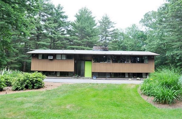 128 Pope Road Acton, MA 01720 - Photo 1 of 13 a front view of a house with a yard