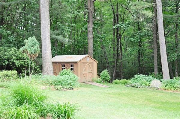 128 Pope Road Acton, MA 01720 - Photo 13 of 13 front view of a house with a yard