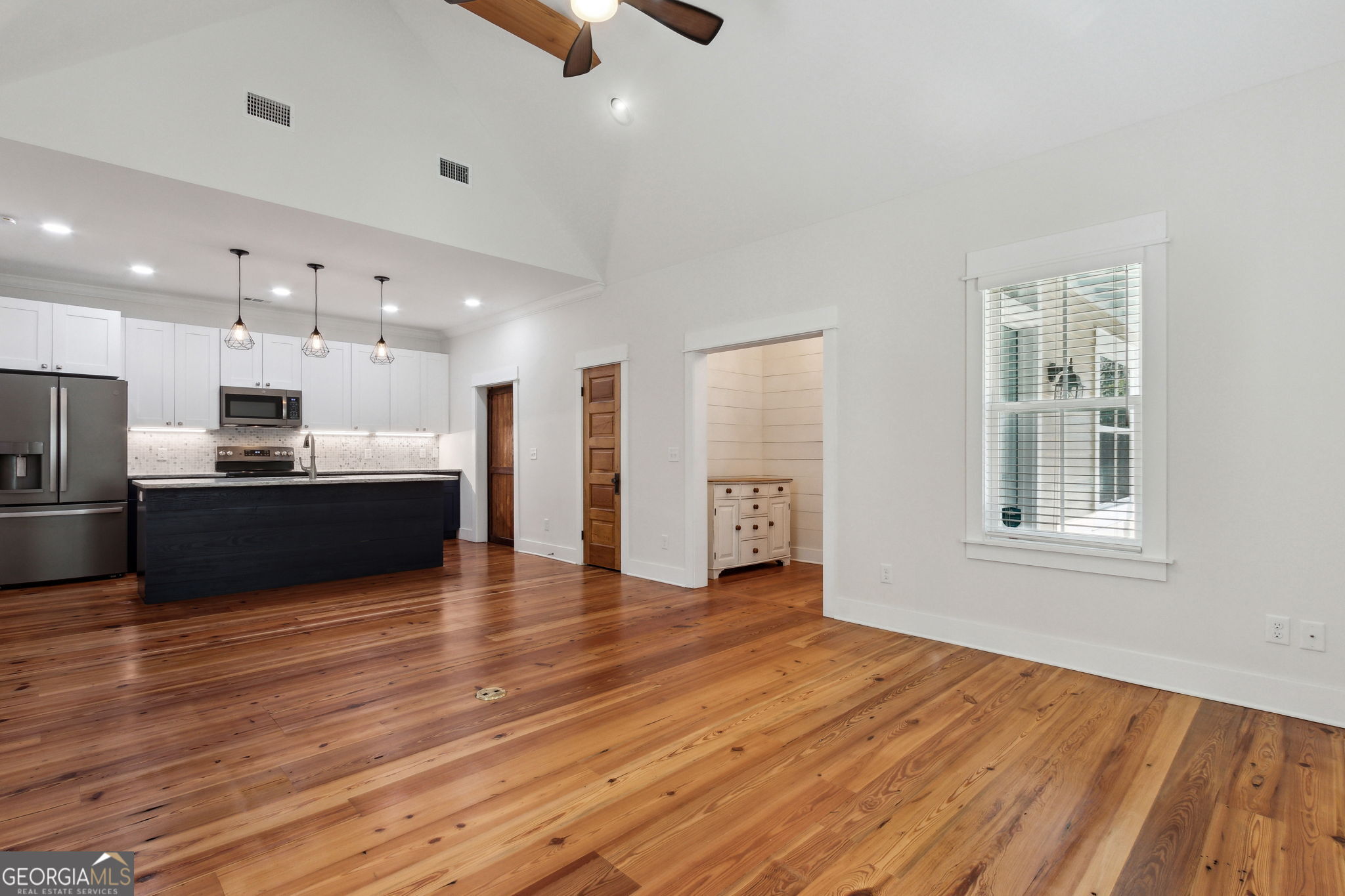 711 Wheeler Street St. Marys, GA 31558 - Photo 14 of 93 a view of kitchen with wooden floor