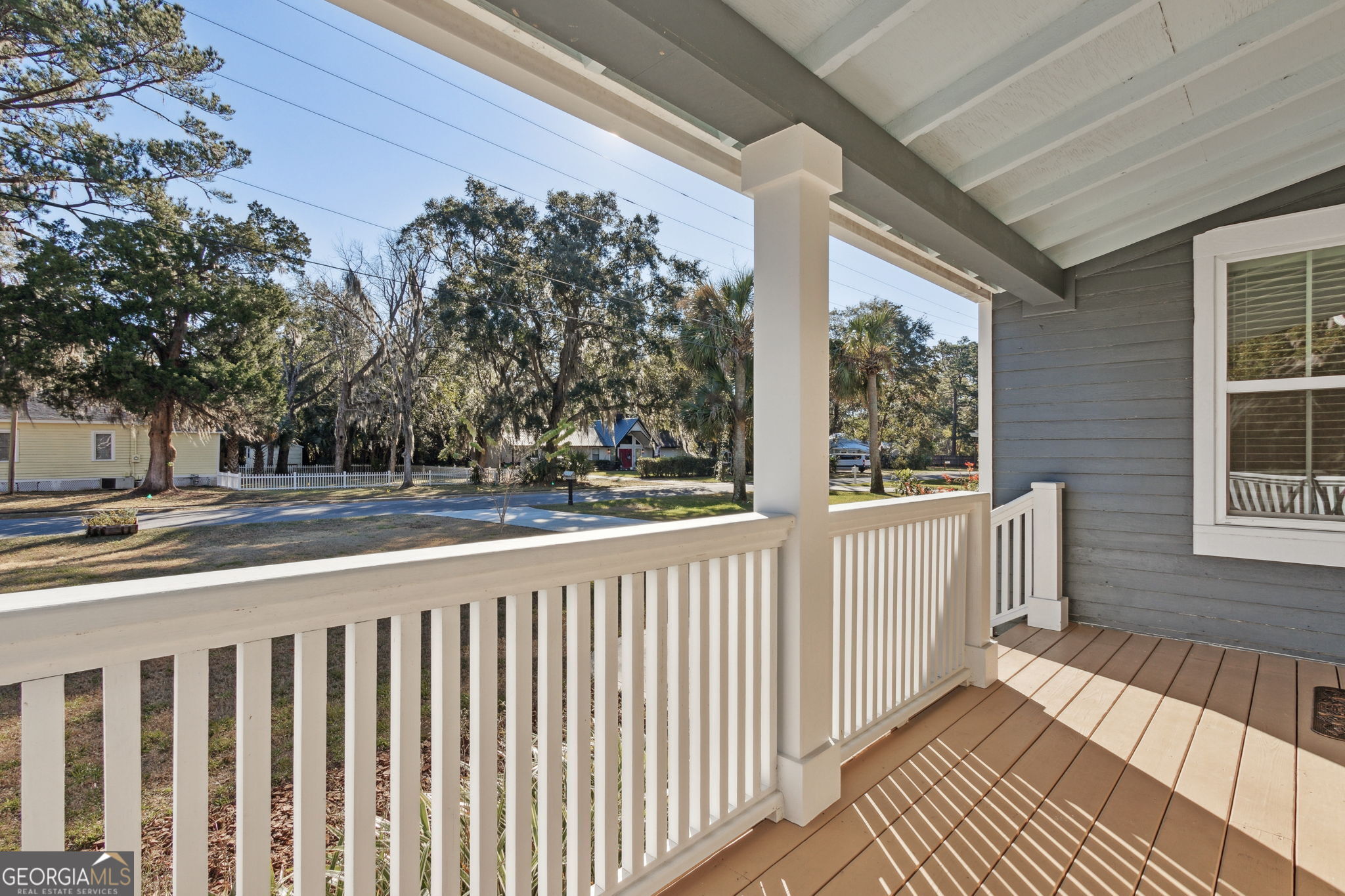 711 Wheeler Street St. Marys, GA 31558 - Photo 8 of 93 a view of balcony with wooden floor and fence