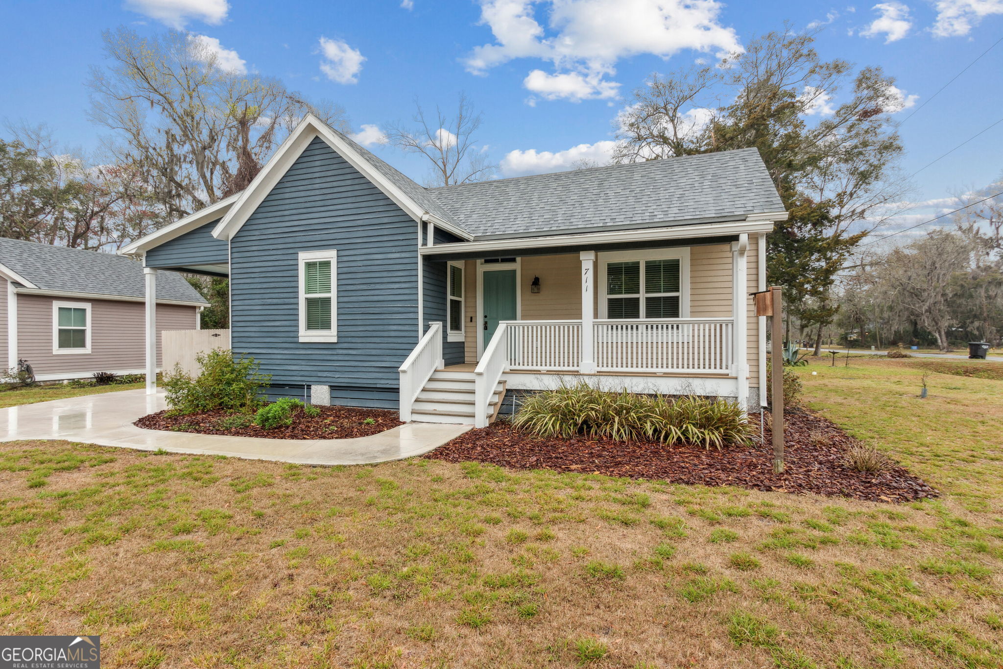 711 Wheeler Street St. Marys, GA 31558 - Photo 85 of 93 a front view of a house with a yard