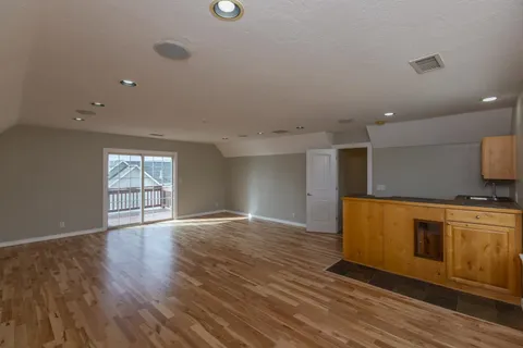 a room with window and stainless steel appliances
