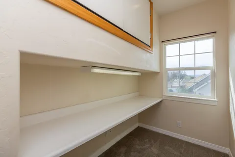 a view of storage and utility room