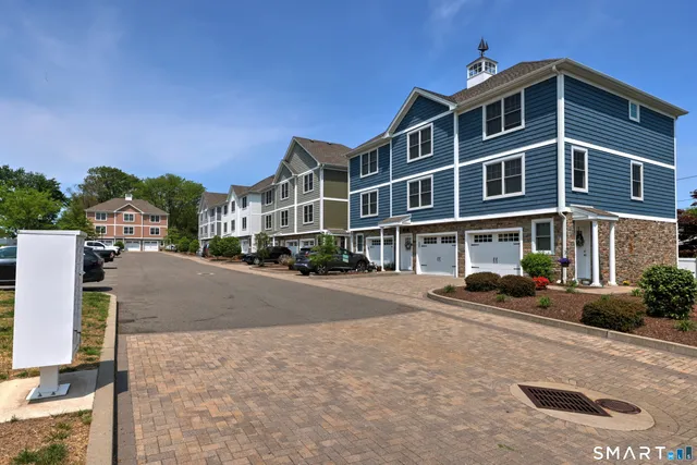 a front view of a building with street view