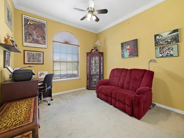 a living room with furniture and a window