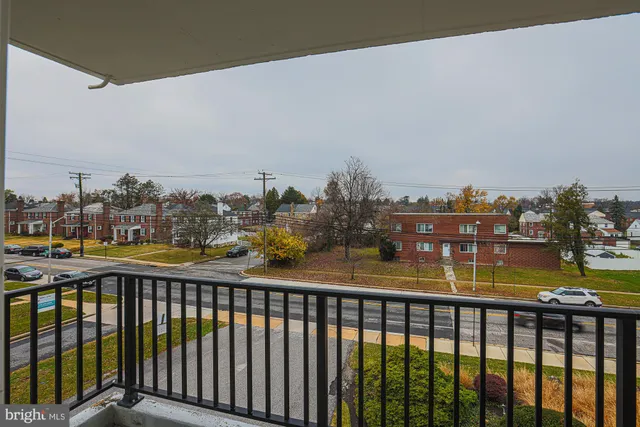a view of a balcony with city view