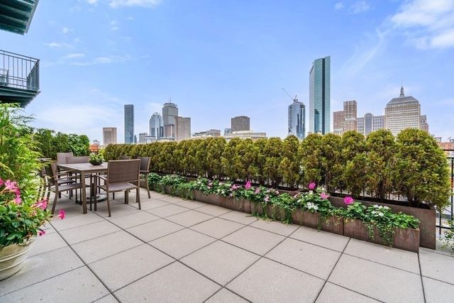 a room with painting and a lamp