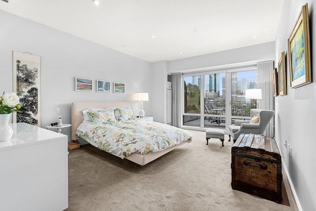 a spacious bathroom with a double vanity sink and a mirror