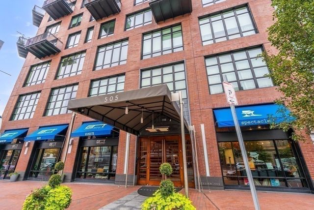 a living room with furniture and window