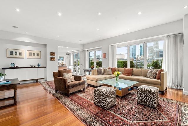 a living room with furniture or couch and a window