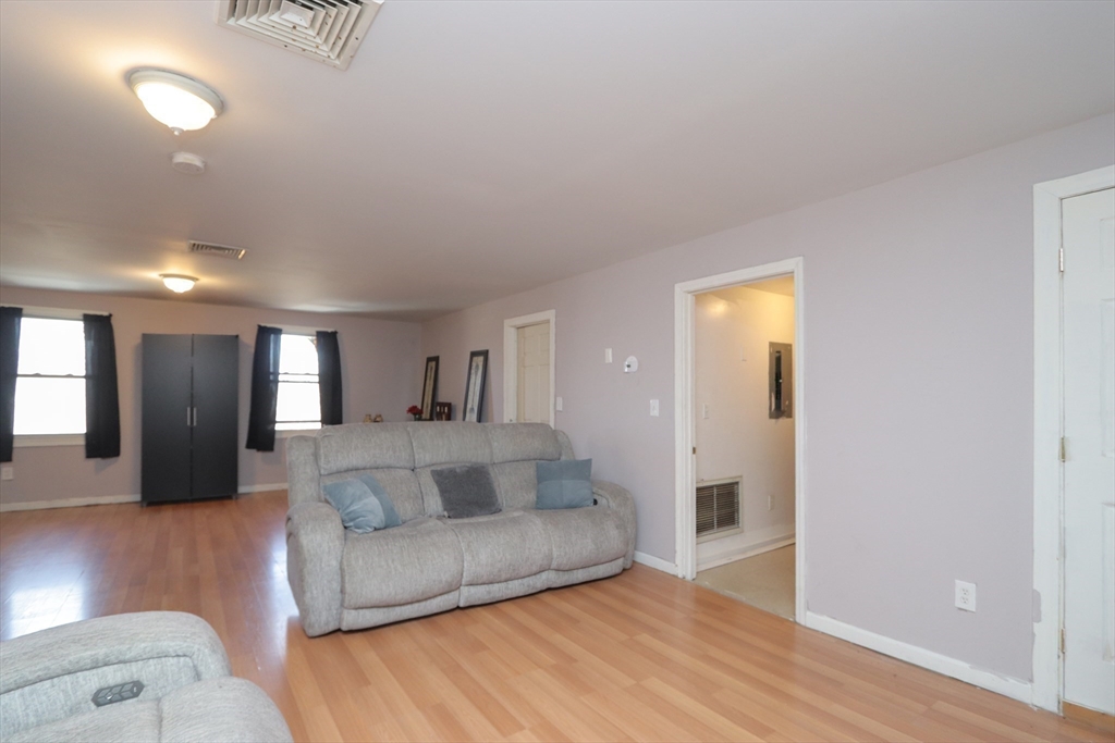 205 Elm Street Westfield, MA 01085 - Photo 15 of 24 a living room with furniture and a couch