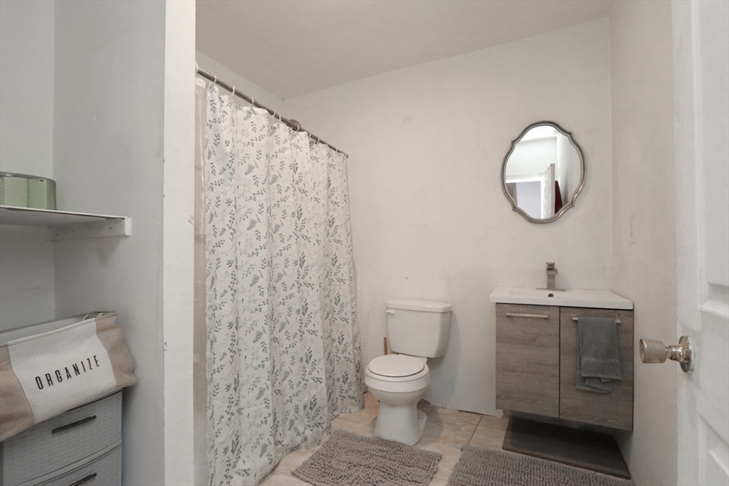 205 Elm Street Westfield, MA 01085 - Photo 24 of 24 a bathroom with a toilet and a sink