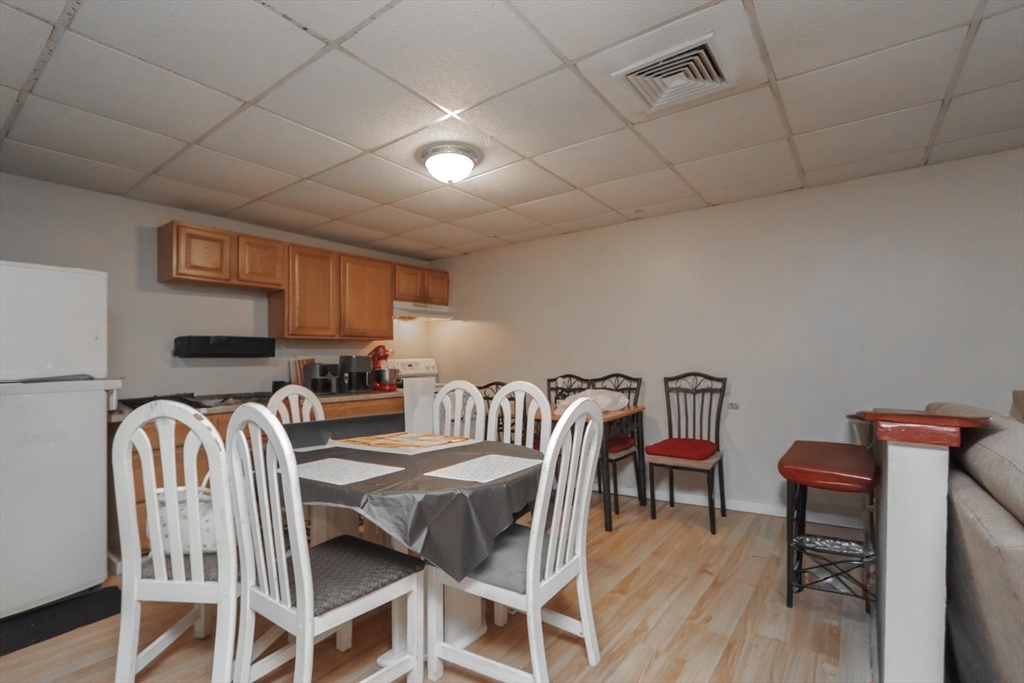 205 Elm Street Westfield, MA 01085 - Photo 9 of 24 a view of a dining room with furniture and wooden floor